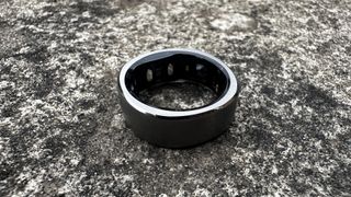 Ringconn smart ring against concrete surface